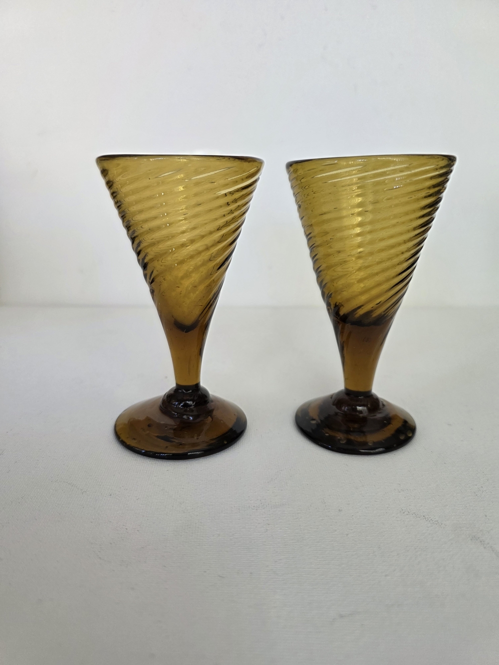 Vintage handblown Amber Swirl Stemmed Glasses - shot Glass Pair